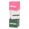 Three boxes of ochaya matcha capsules on a white background